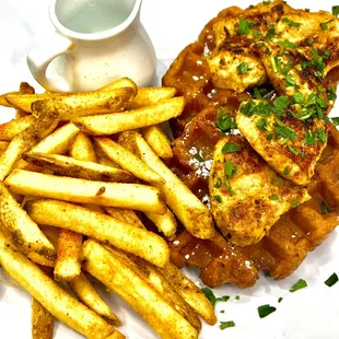 Yummy Lebanese Chicken and Waffles served with a Spicy Maple Syryp