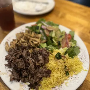 a plate of food on a wooden table