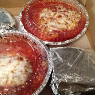 Classic lasagna with side salad and breadsticks