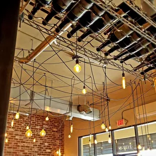 I love the interior. Wine overhead and the lights.