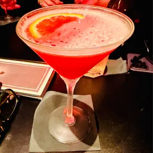 a cocktail in a coupe glass