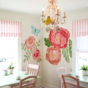 a dining room with a chandelier