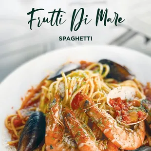 a plate of pasta with shrimp and musselling