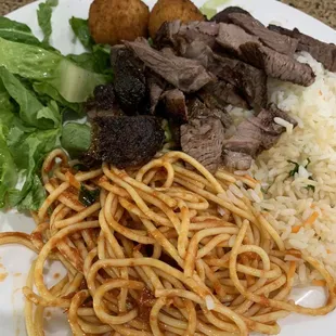 Sirloin steak, spaghetti, rice and salad veggies