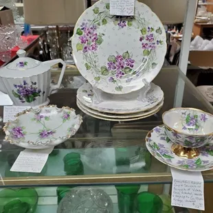 Vintage glassware decorated with Violet flowers.  Manufactured by miscellaneous companies