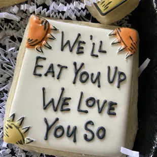 a plate of decorated cookies