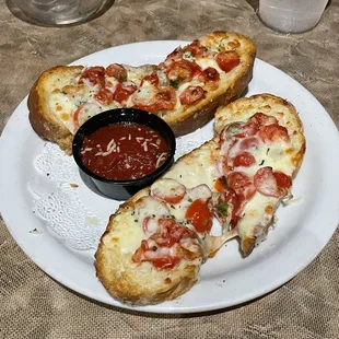 two slices of pizza on a plate