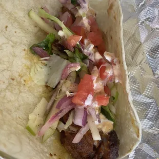 Fish taco (1 of 3).. tortillas were outstanding. Filling had enough kick and various flavors I didn't even ask for hot sauce.