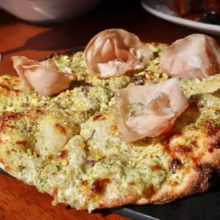 For Oliver&apos;s Pinsa Romana (Roman-Style Pizza), we had the Mortadella &amp; Pistachio made with fresh pesto, &amp; fior di latte mozzarella.