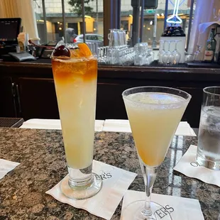 two cocktails on a table