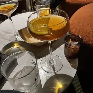 two glasses of wine on a table