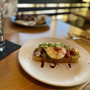 Avocado toast with eggs added