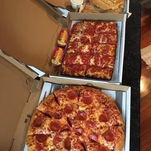 Current special, 2 large 1-topping pizzas and 8 piece bread sticks $19.99