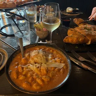 Gnocchi with vodka sauce and a meatball