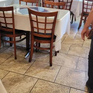 tables and chairs in a restaurant