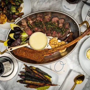 30 Day Dry-Aged Tomahawk Steak w/aligot potatoes, rib bone milanese