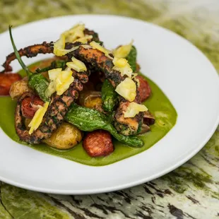 Grilled Spanish Octopus w/ crispy potatoes, chorizo, fried peppers, preserved lemon, and salsa verde