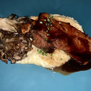 Lamb on truffle risotto and mushrooms