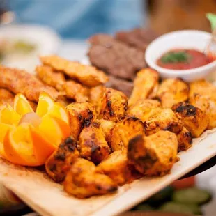a platter of grilled food