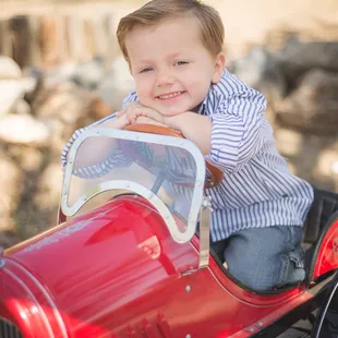 Children's portrait session at with vintage toy car