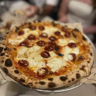 Mini pepperoni with burrata cheese and hot honey