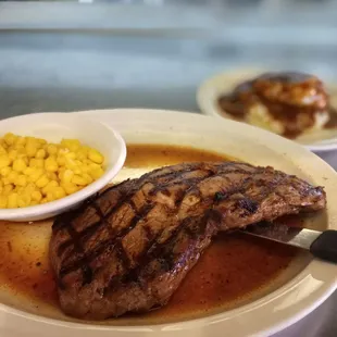 a steak and corn