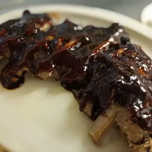 ribs covered in bbq sauce
