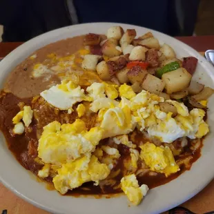 Breakfast enchiladas with potatoes instead of rice.