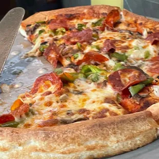 Olivia&apos;s subs and pizza veggie pizza with pepperoni. It was delishious