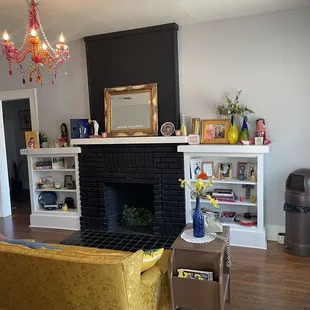 a living room with a fireplace