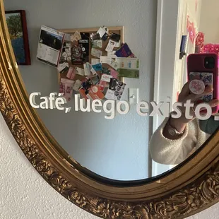 a woman taking a selfie
