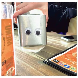 Napkin holder with googly eyes