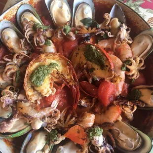 Bucatini Frutti Di Mare with lobster, black mussels, shrimp and baby octopus in Arabbiata sauce