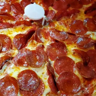 Large double pepperoni pizza.