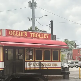 Sits in a parking lot at a red light. Can't miss it