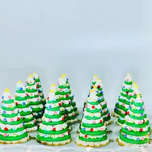 a row of decorated christmas trees