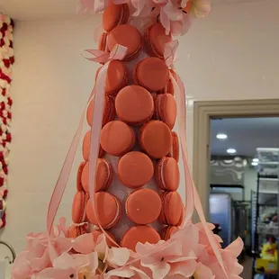a tower of macarons and flowers