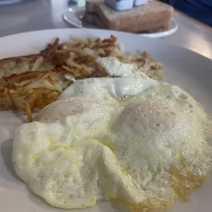 Eggs over medium and hash browns