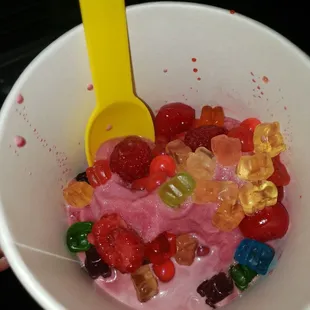 Berry acai frozen yogurt with gummy bears and some fruits!