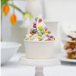 Vanilla Frozen Yogurt Soft Serve with pastel chocolate gems