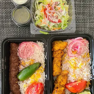 Kobideh beef (left) Chicken kabob (right) Salad and sauce (yogurt and cilantro)