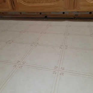 a tile floor in a kitchen