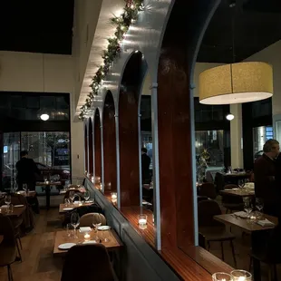 a view of a dining room with candles