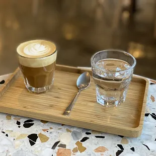 Delicious oat cortado paired with seltzer