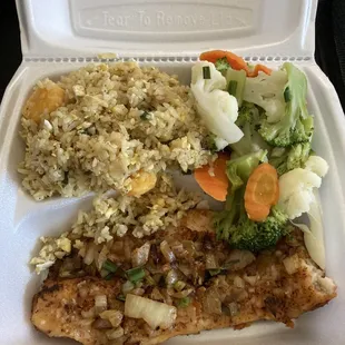 Grilled fish, sautéed vegetables and rice.