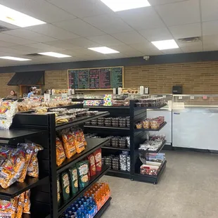 Newly remodeled store with a variety of chocolates, popcorn and ice cream.