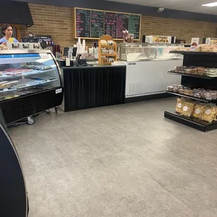 Newly remodeled store with a variety of chocolates, popcorn and ice cream.
