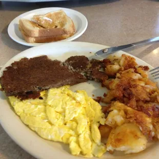 Scrapple, scrambled eggs, home fries actually fried, toast for $5.45.