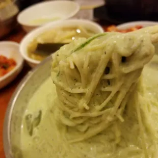 Cold bean noodle soup (Kong guksu), look how the cold nutty creamy soup grabs onto the noodle, eat with kimchi