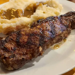 Pretty as a picture and cooked exactly to order but tough as old shoe leather! Not worth the $30 tab!